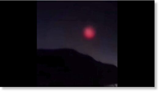 Необычное красное свечение в ночном небе после падения метеорита в Китае