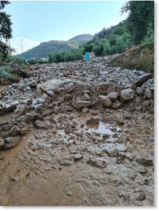 Flood debris on road in Jaén Province, Spain August 2021.